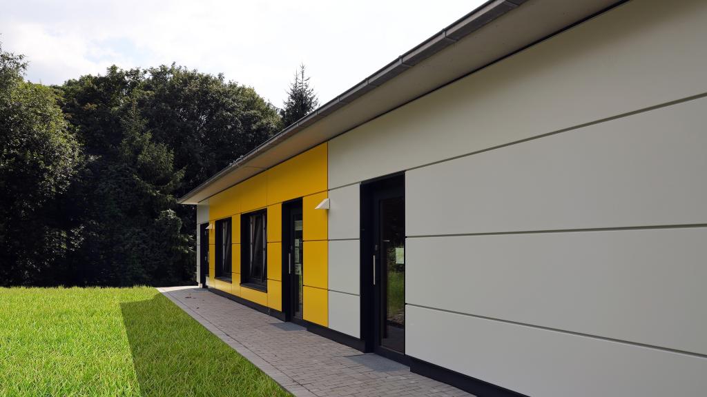 Gelbe Fassadengestaltung der Kita in Gladbeck in Modulbauweise