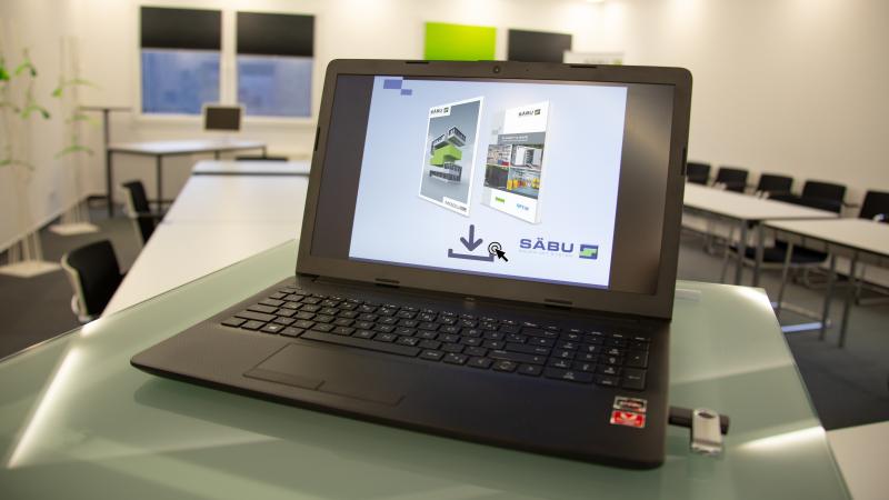 Laptop mit Infomaterial von SÄBU zum Download